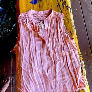 Sweet Wanderer size Med sleeveless pink shirt.